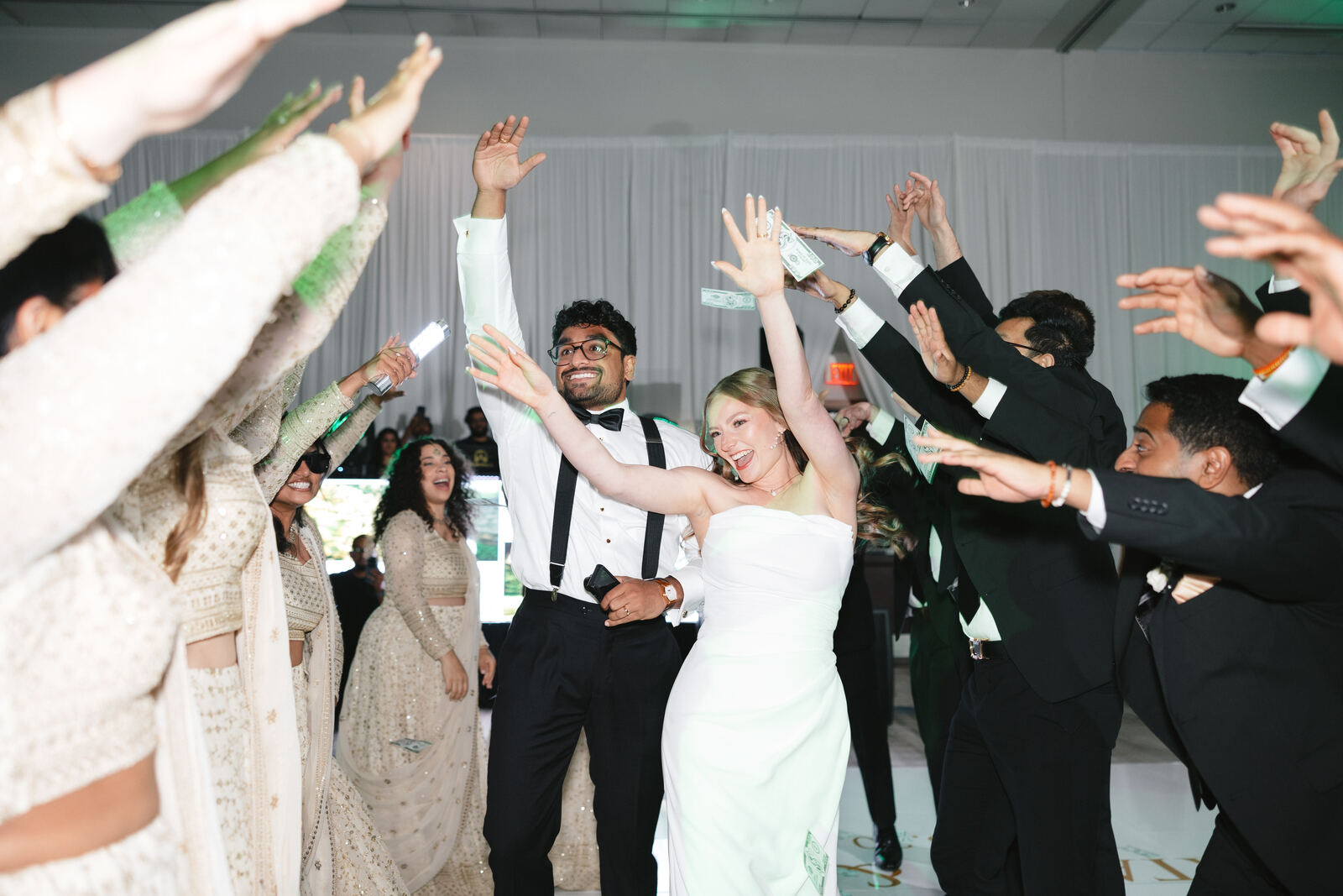 Bride and groom celebrating on the dance floor
